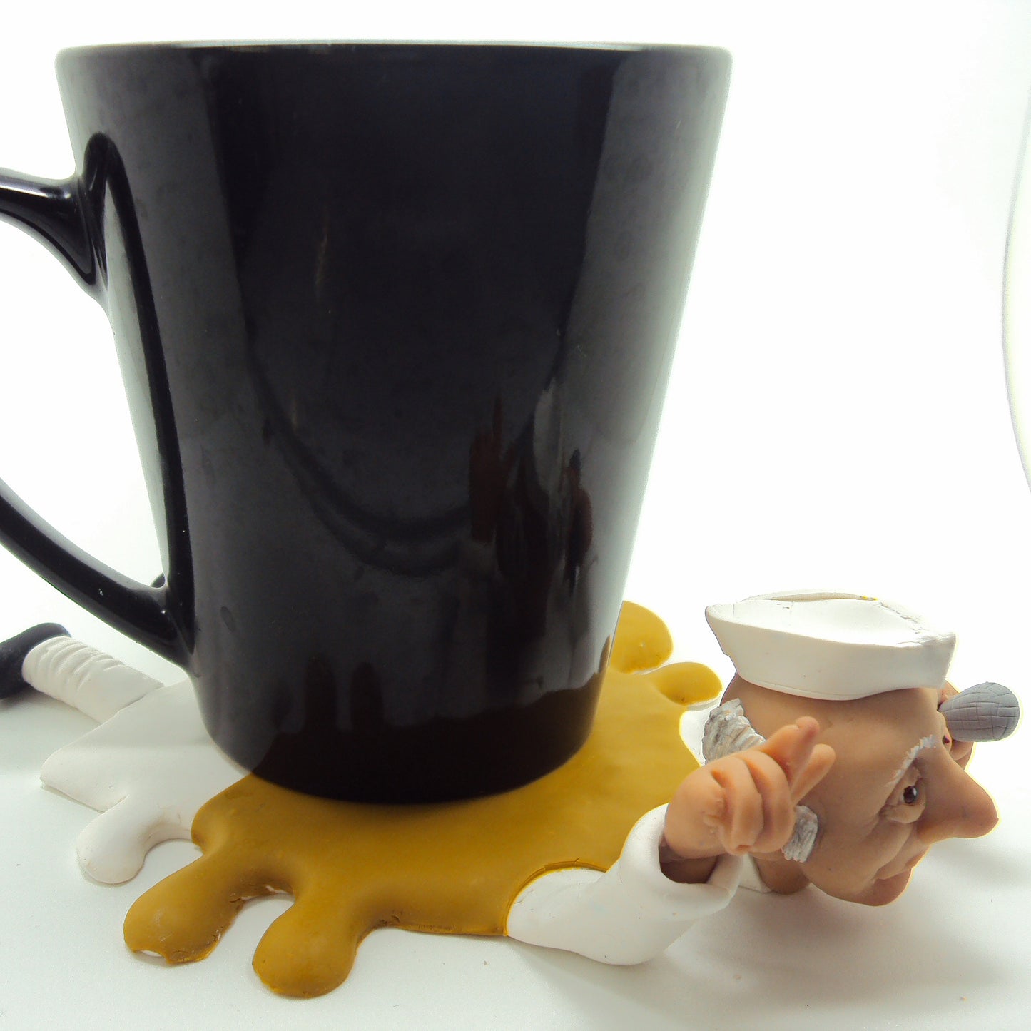 Dessous-de-verre en argile éclaboussé par un politicien indien bruyant